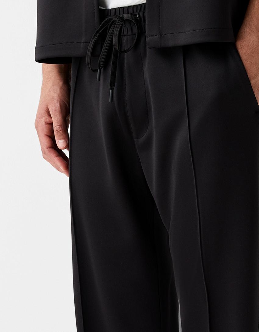 سروال إنترلوك بخطوط جانبية-أسود-3