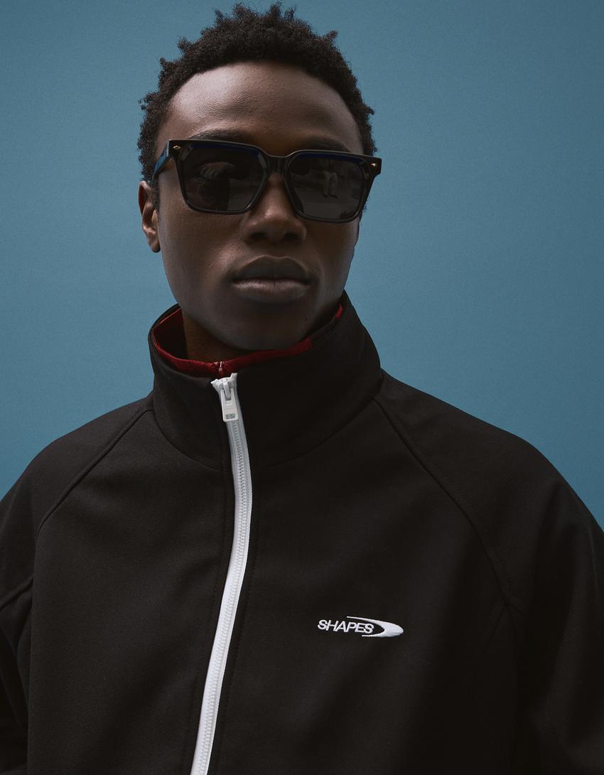 Jaket ritsleting bergambar-Hitam