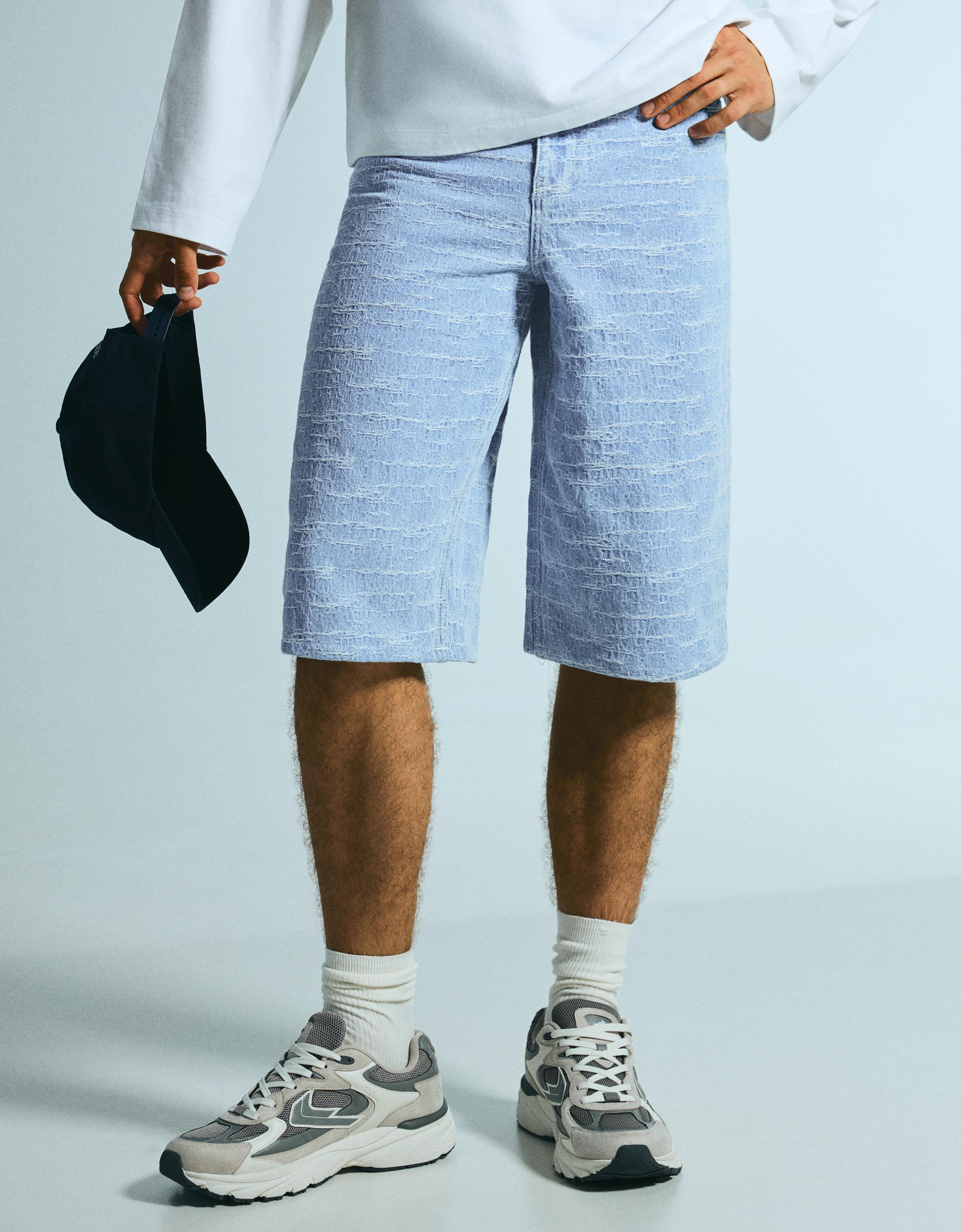 Super baggy textured denim Bermuda shorts — Light blue