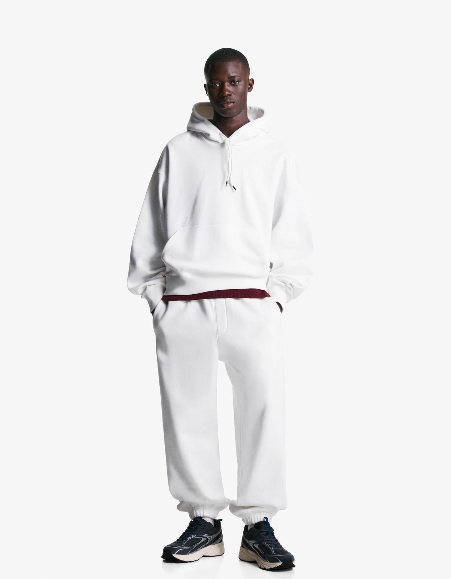 Bershka spodnie jogger z dzianiny dresowej biały