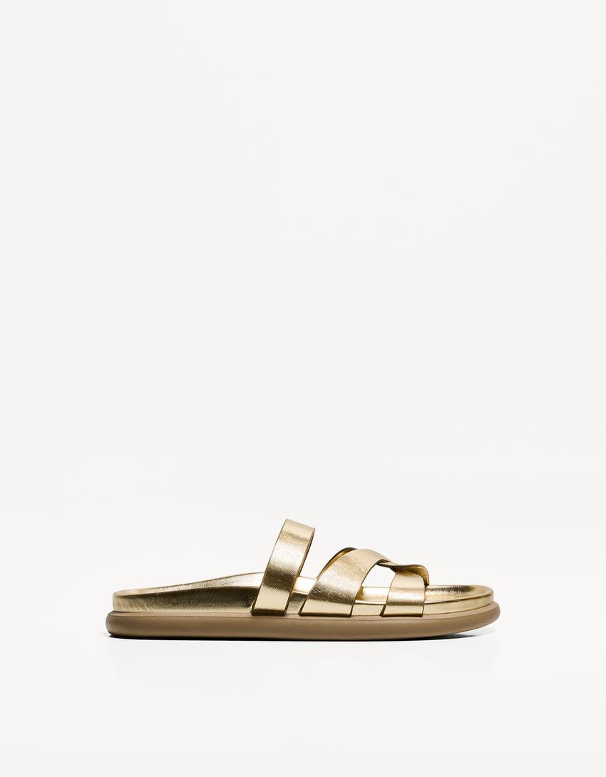 Flade sandaler med flere remme-Guld