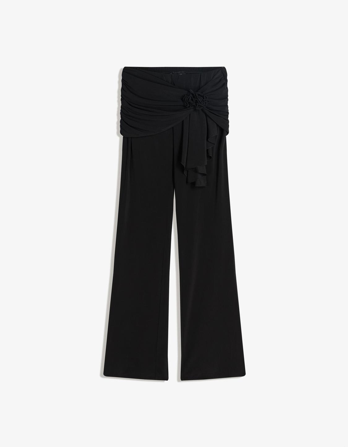 Floral draped bell bottom trousers