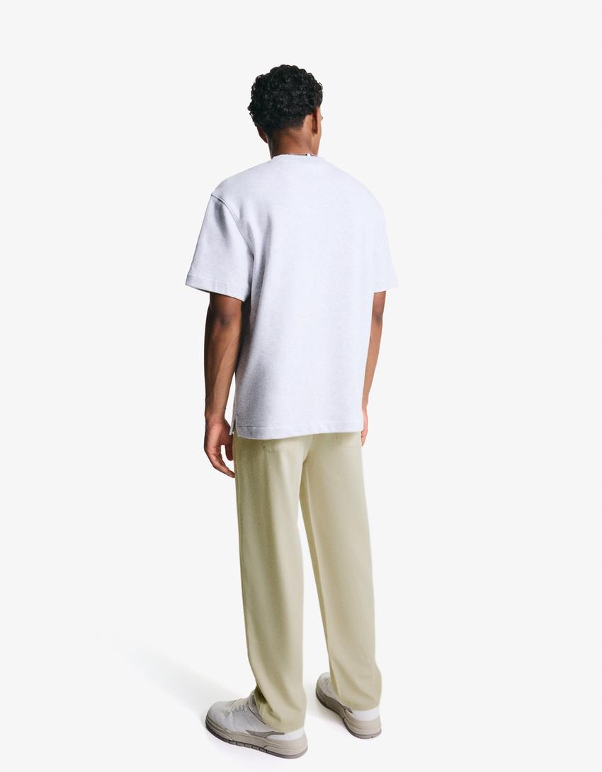 מכנסי טרנינג מחויטים Straight fit-שמנת-1