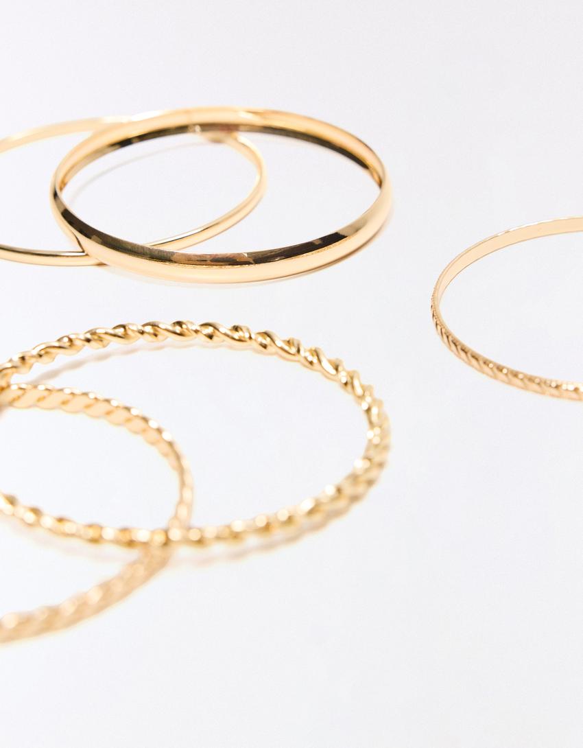 Pack 7 pulseras finas-Oro