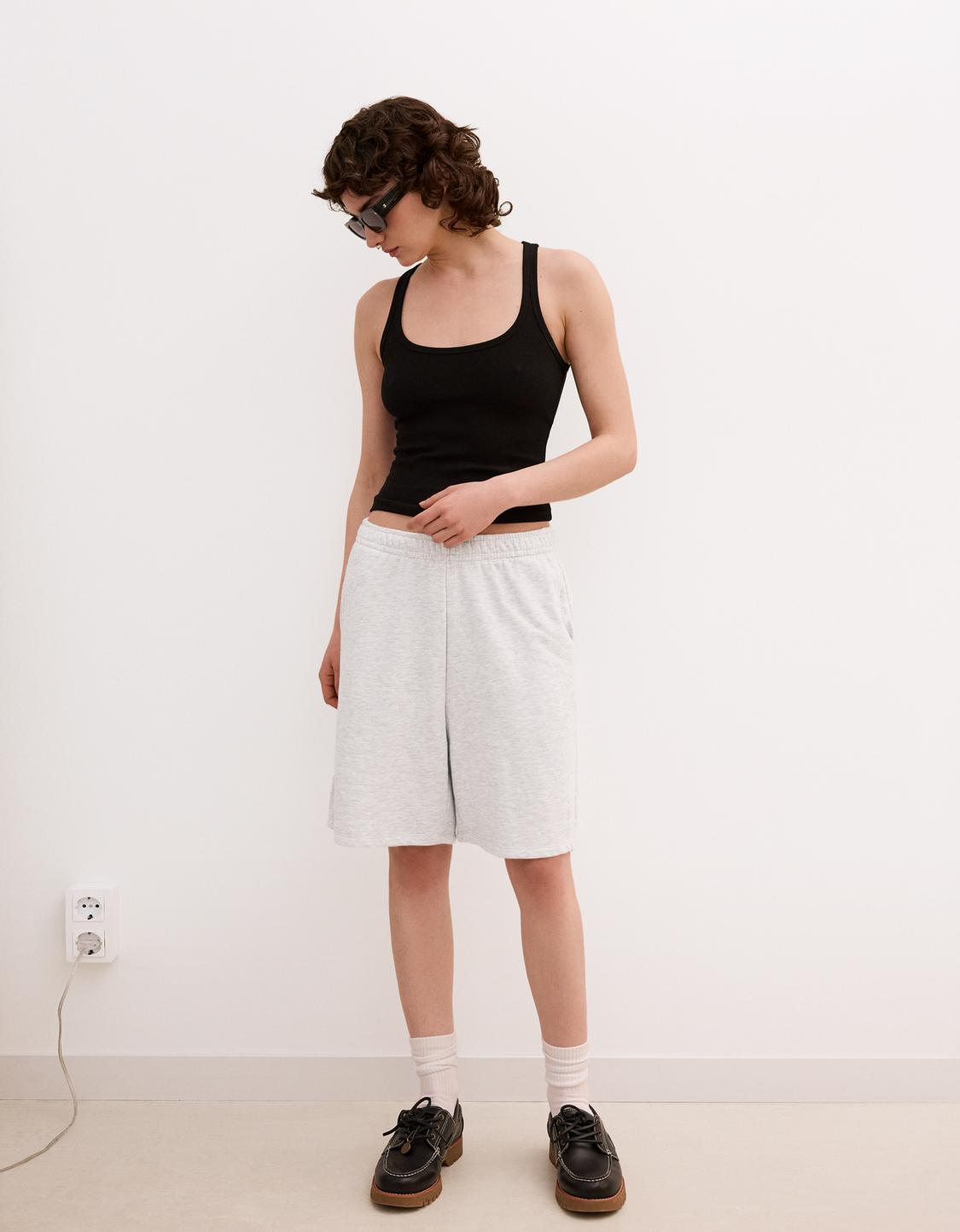Plush Bermuda shorts with embroidery