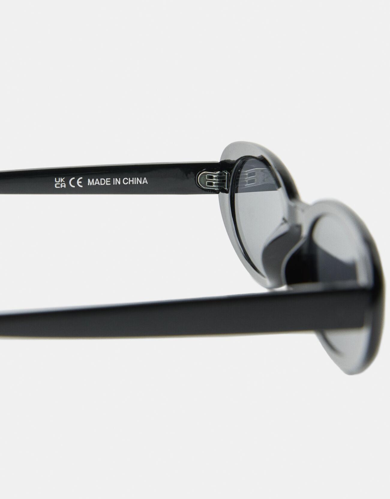 Oval plastic sunglasses — Black