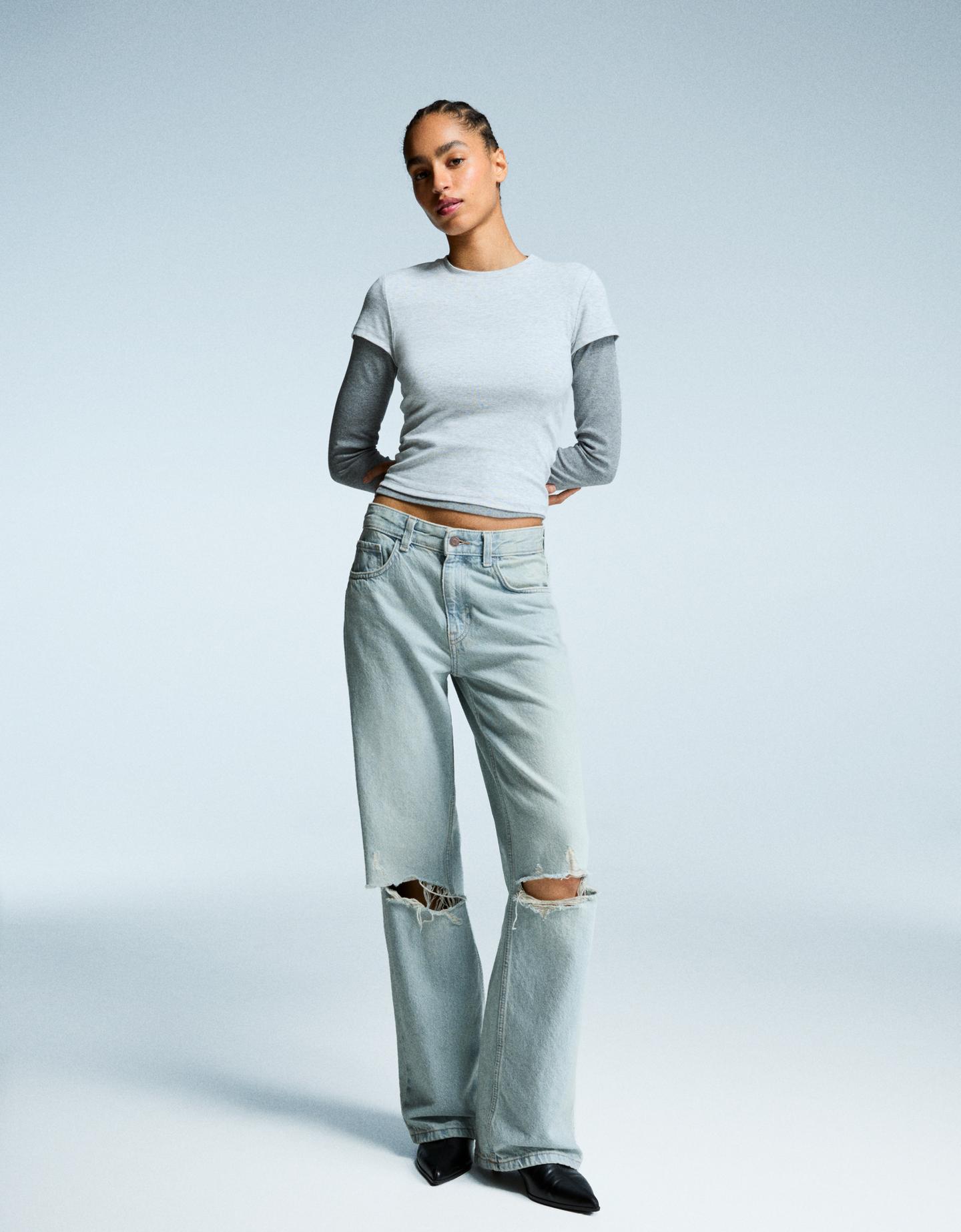 Bershka jeansy wide leg z dziurami niebieski