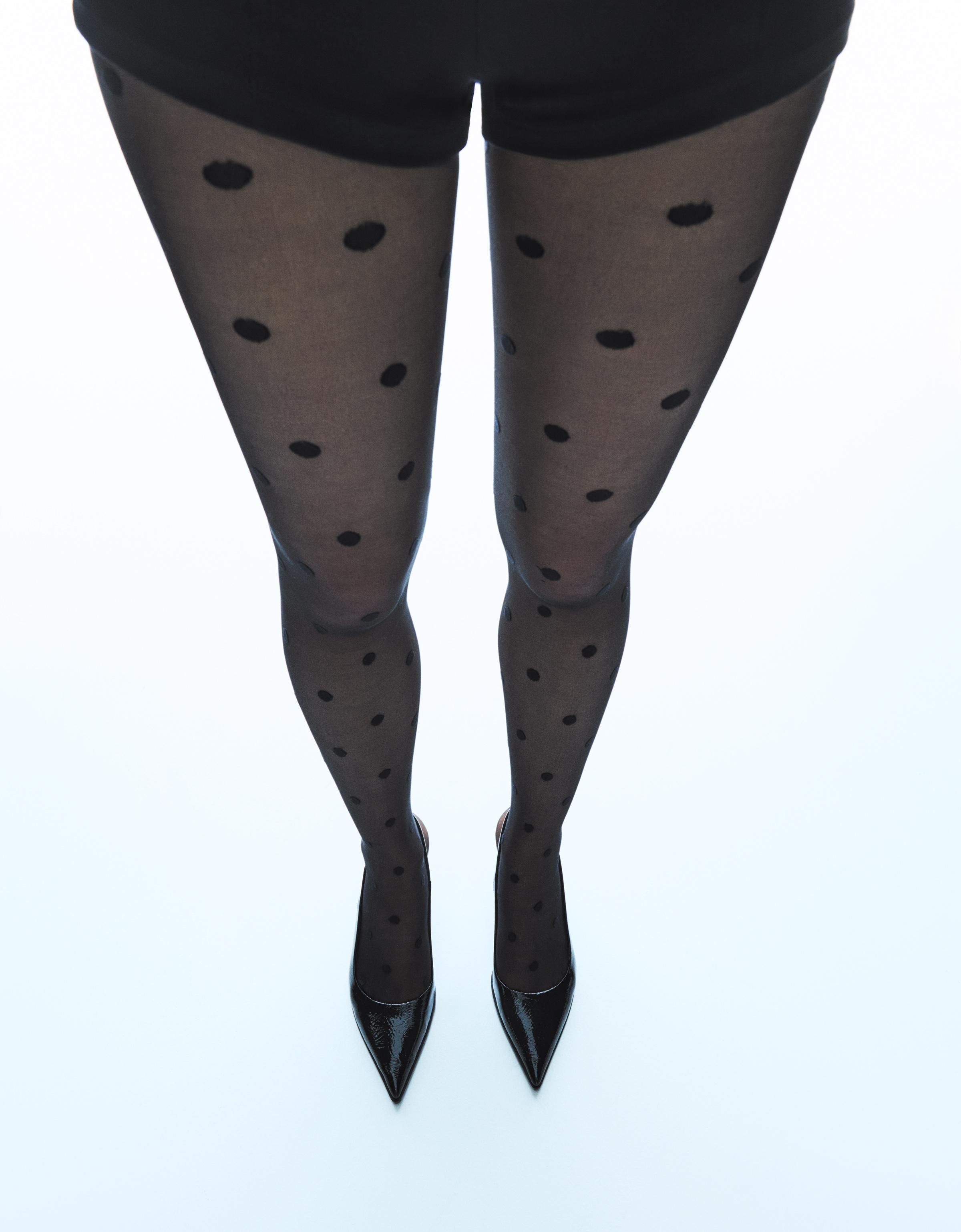 Dotted mesh tights