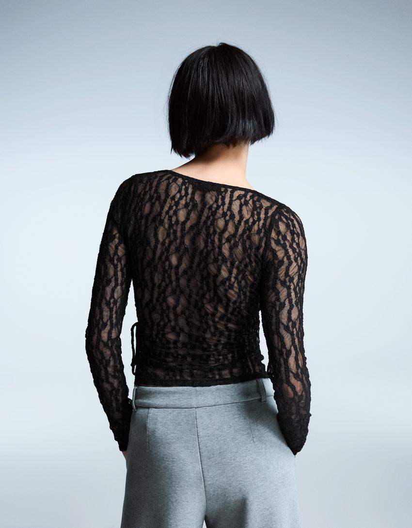 Langarmshirt mit Spitzenknoten-Schwarz