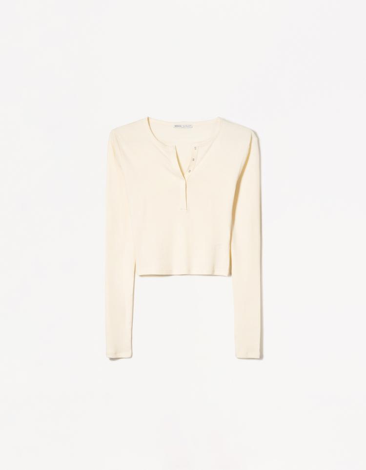 Long sleeved button neck top