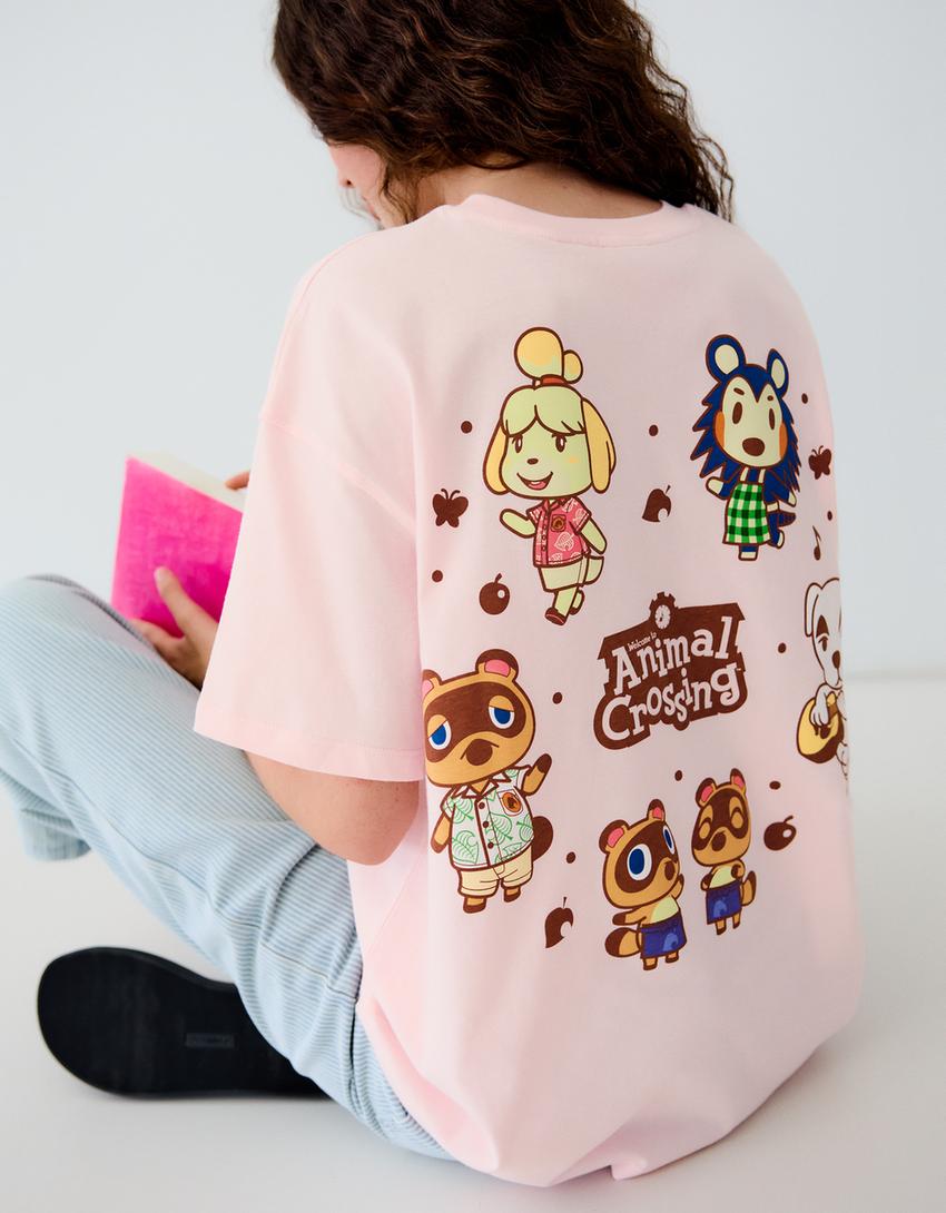Koszulka oversize z nadrukiem ANIMAL CROSSING-Różowy