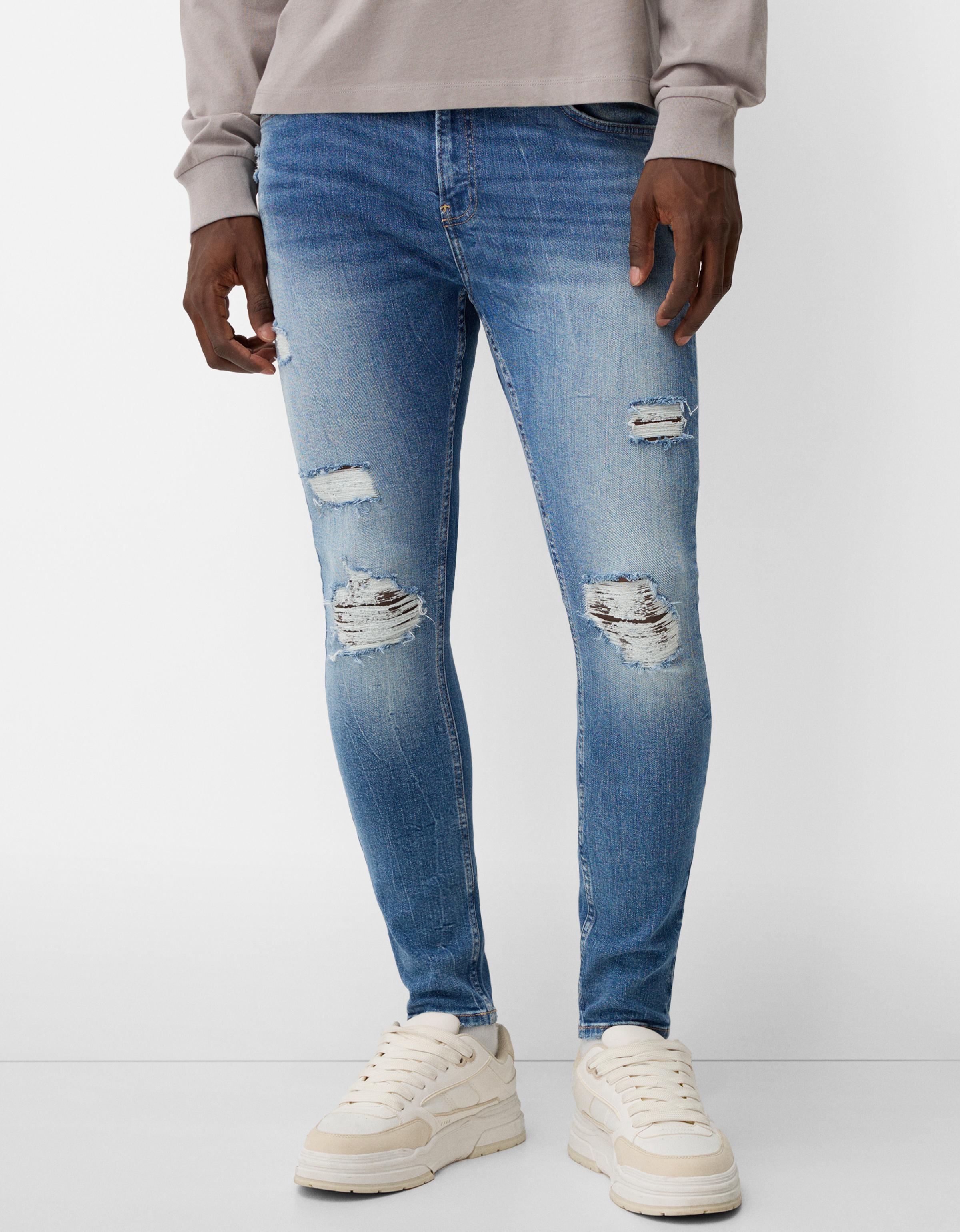 Bershka Super Skinny Jeans Mit Rissen Herren 38 Blau