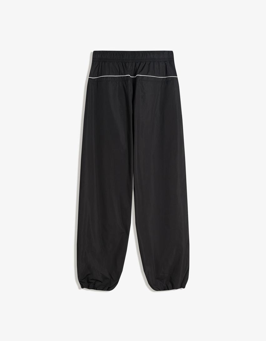 Pantalon super baggy fit technique sport-Noir