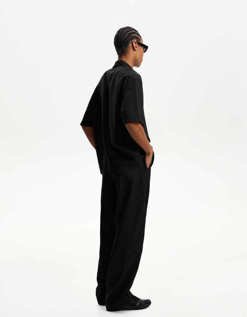 بنطلون رياضي بمزيج كتاني وساق عريضة-أسود