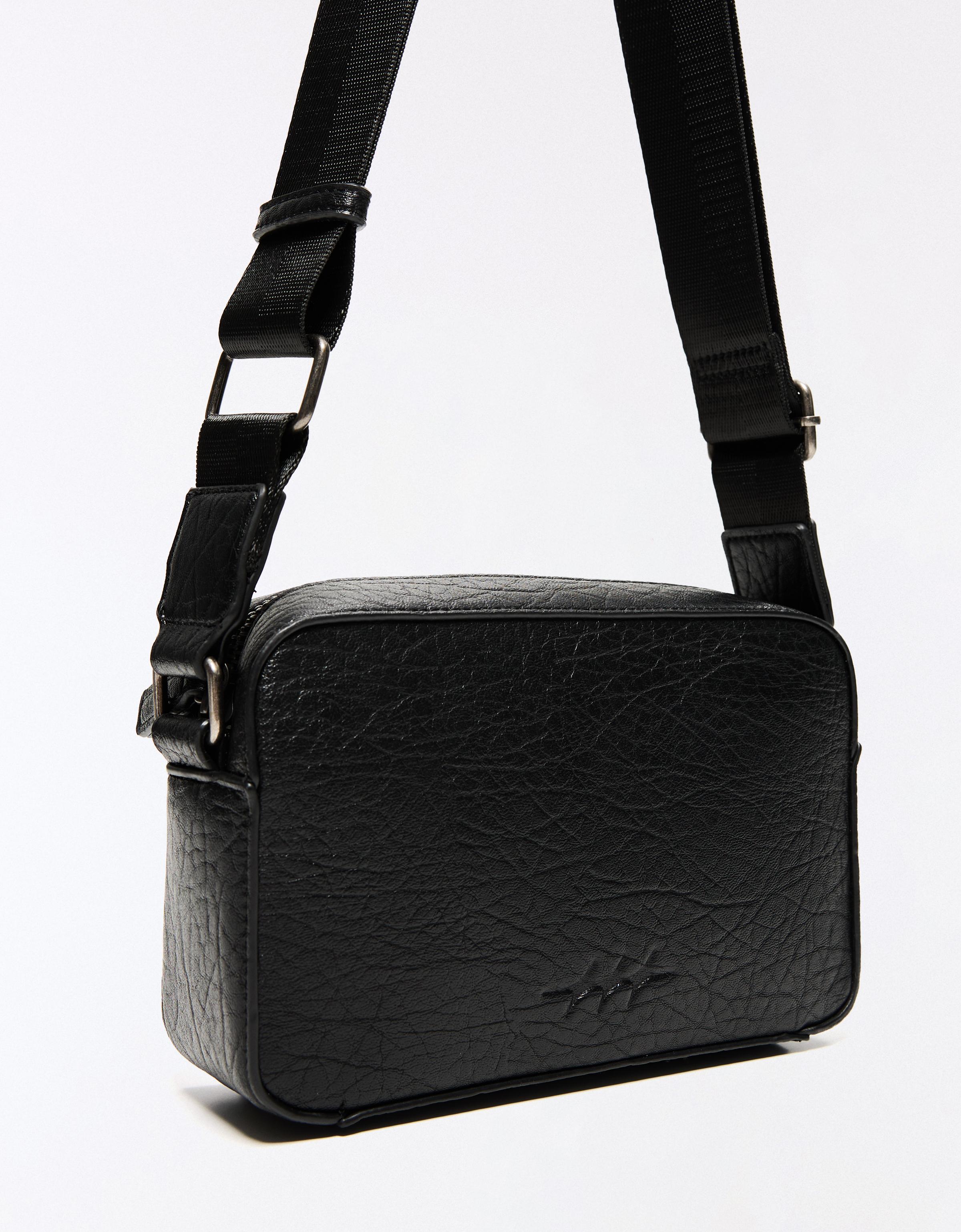 Embossed star crossbody bag — Black