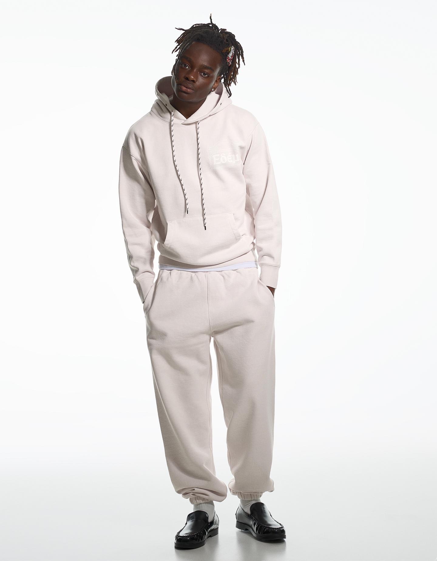 Bershka spodnie jogger aries x bershka różowy