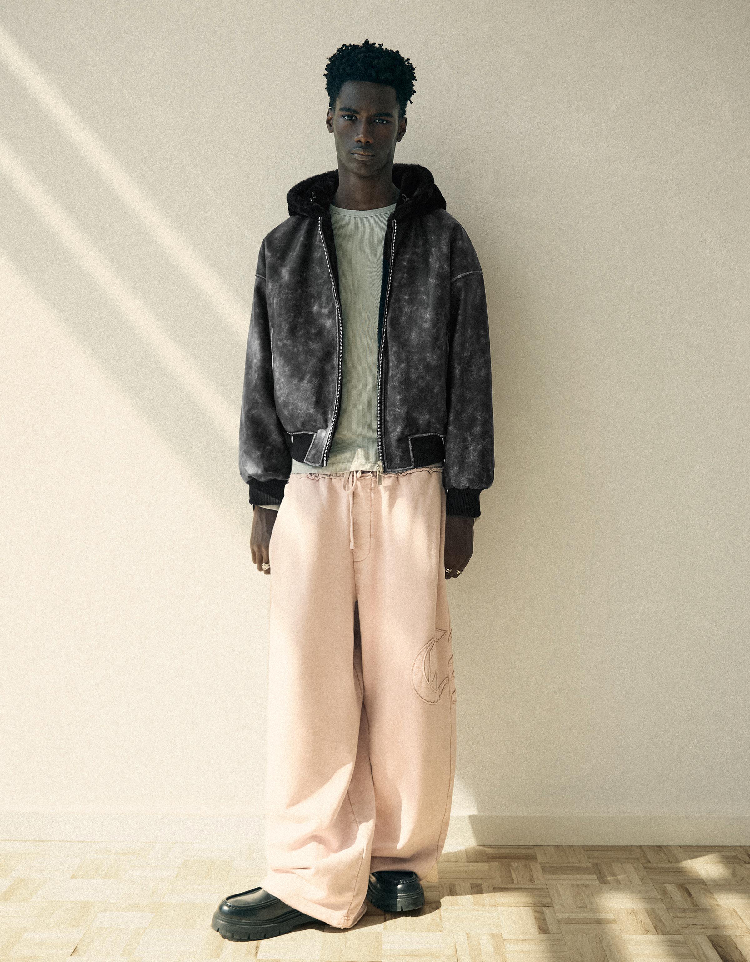 Reversible faux fur hooded jacket — Black