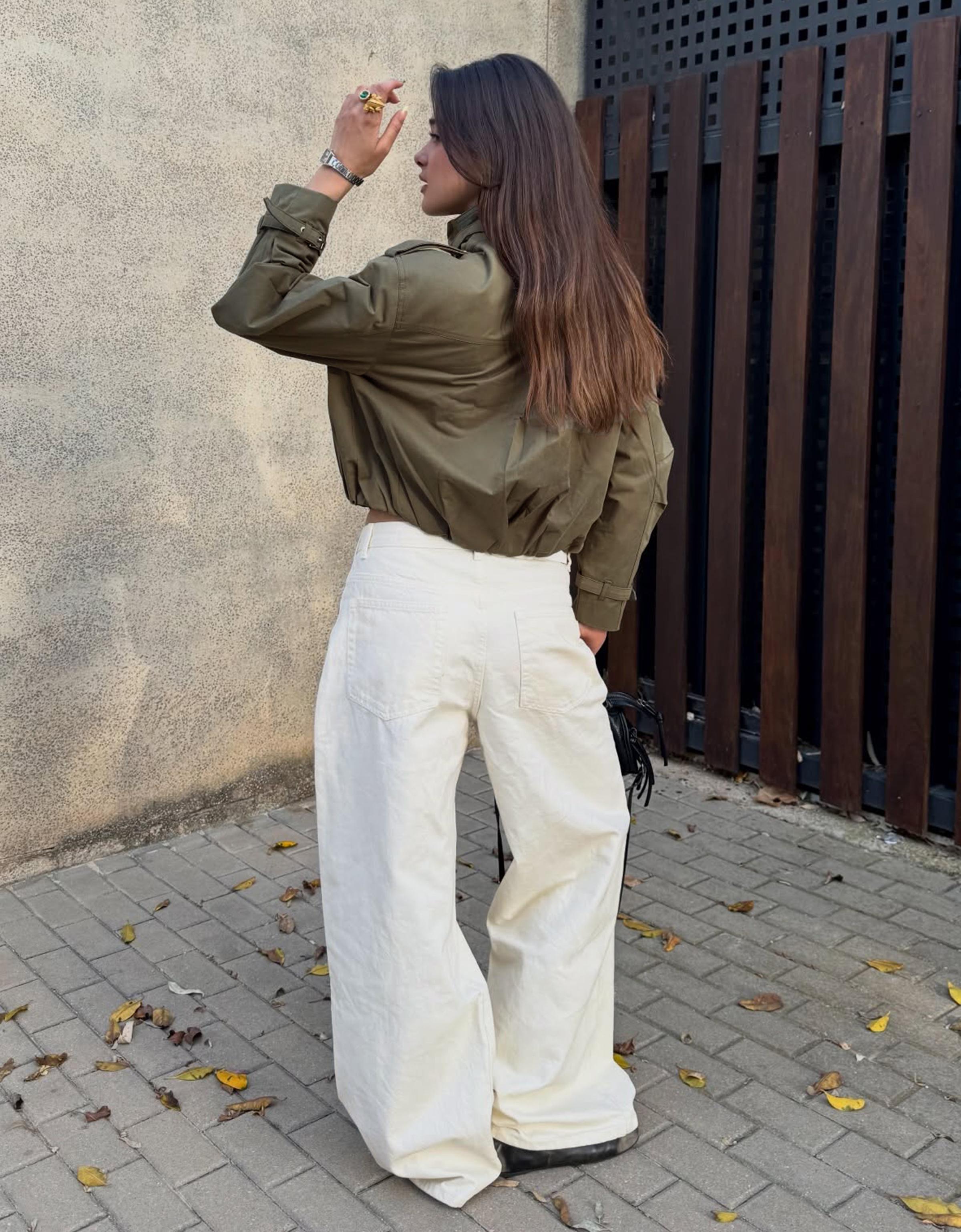 Wide leg jeans with crossover waist — Cream