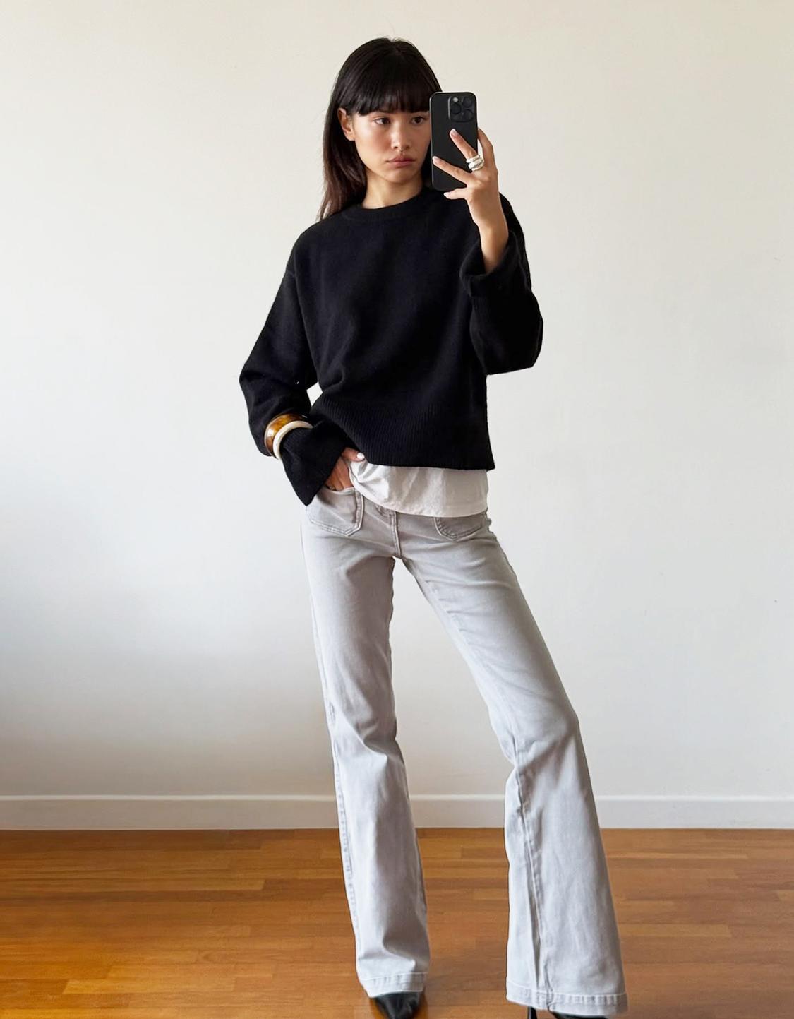 Flare trousers with flaps and pocket