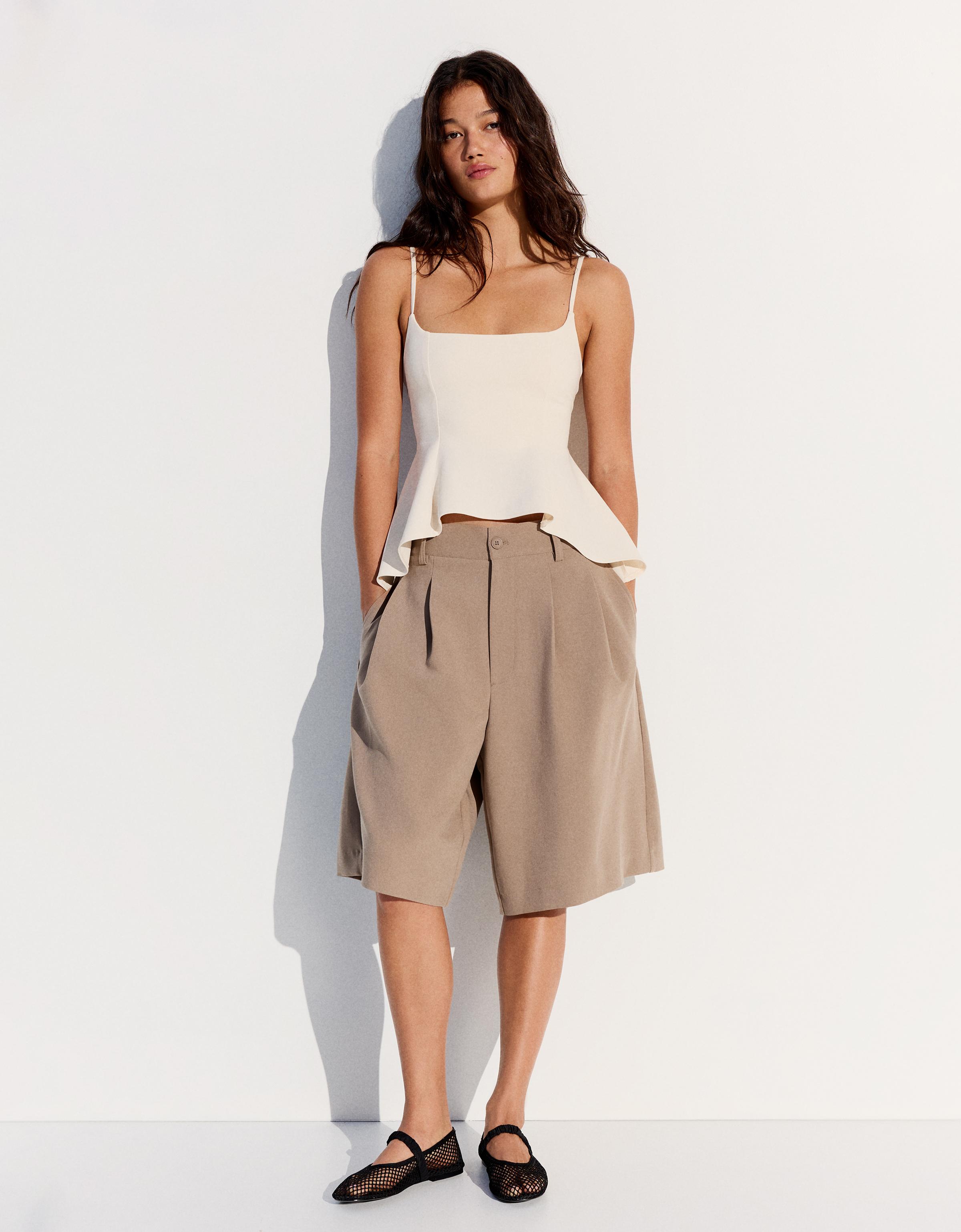 Ruffle strappy top — Cream