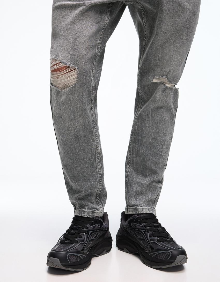 Carrot fit jeans met scheuren-Grijs