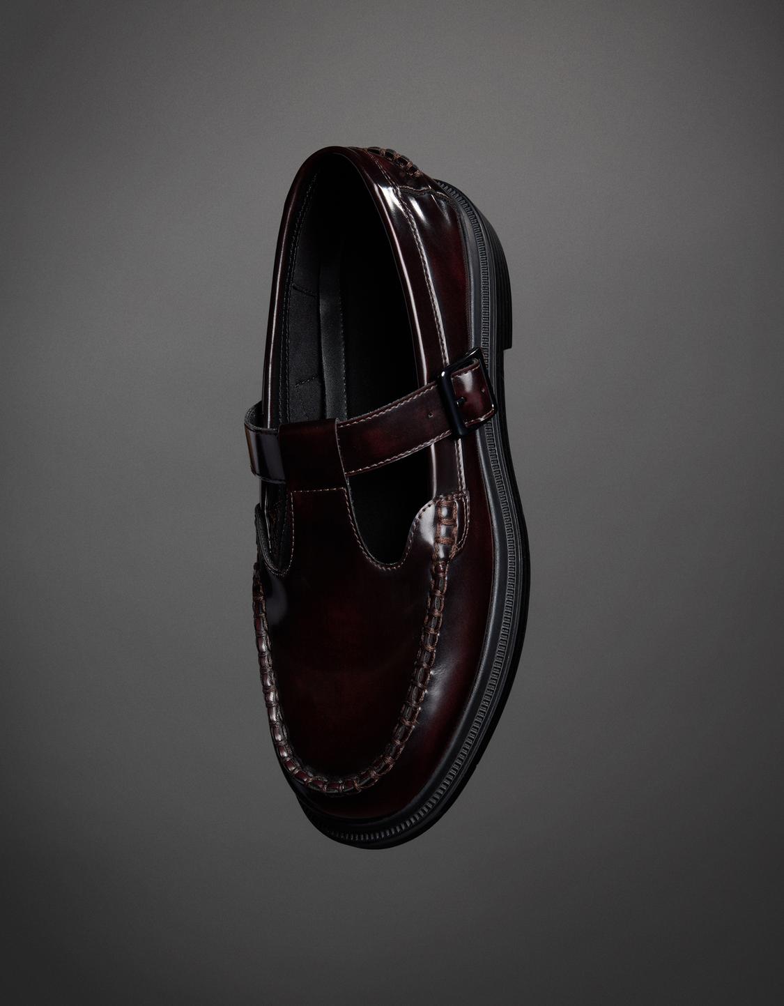 Shoes with buckled strap