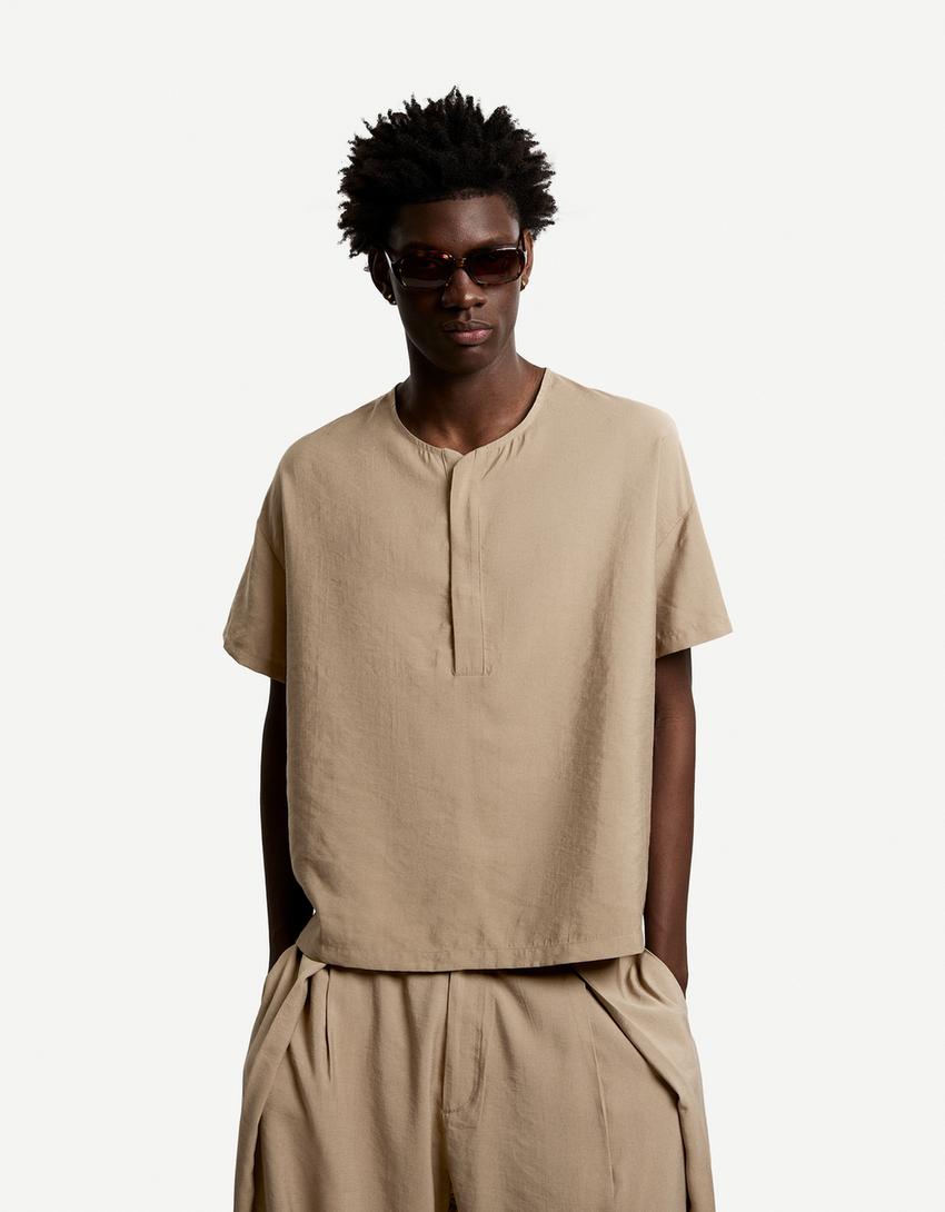 Camisa manga corta oversize fluida-Arena-0