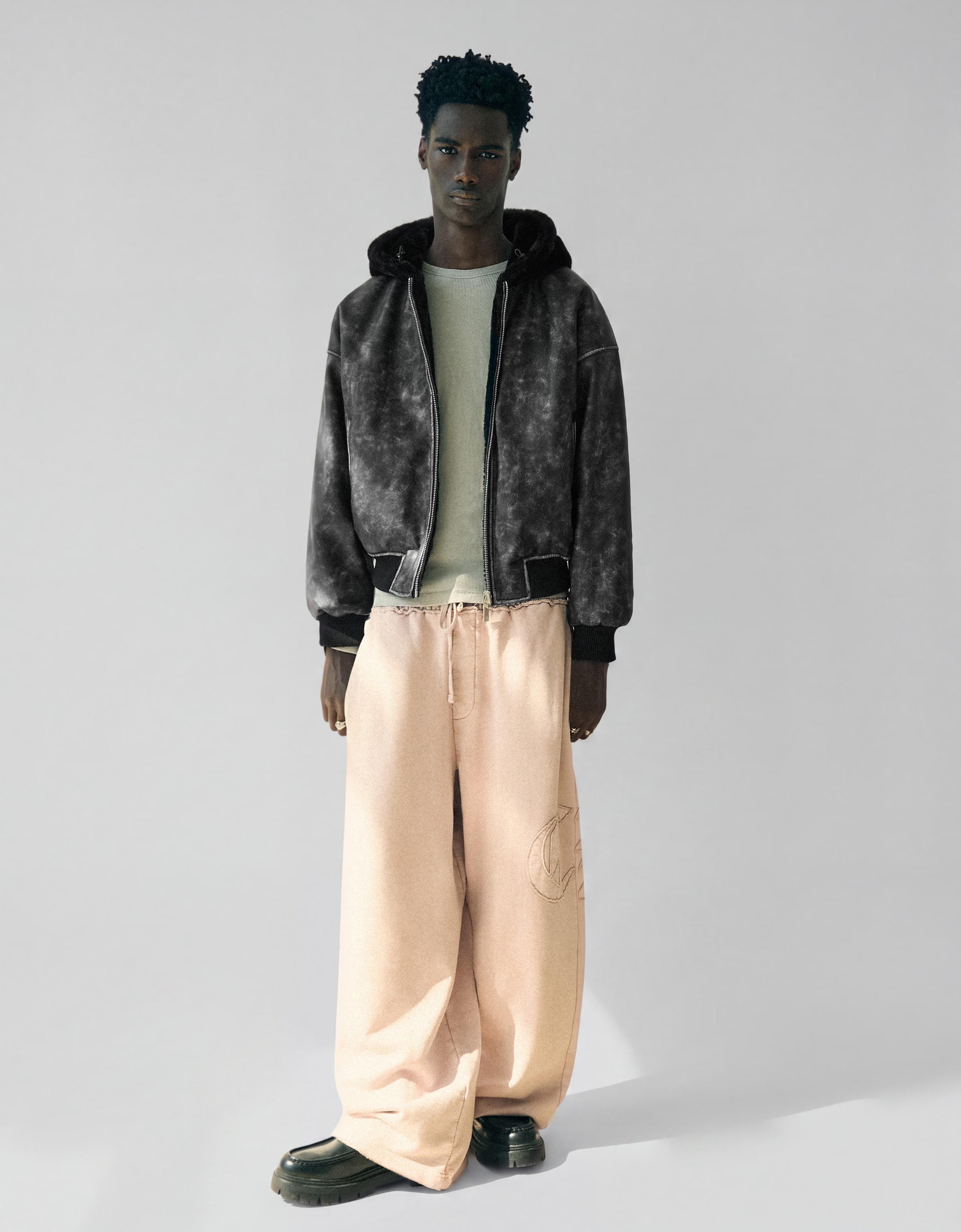 Reversible faux fur hooded jacket — Black