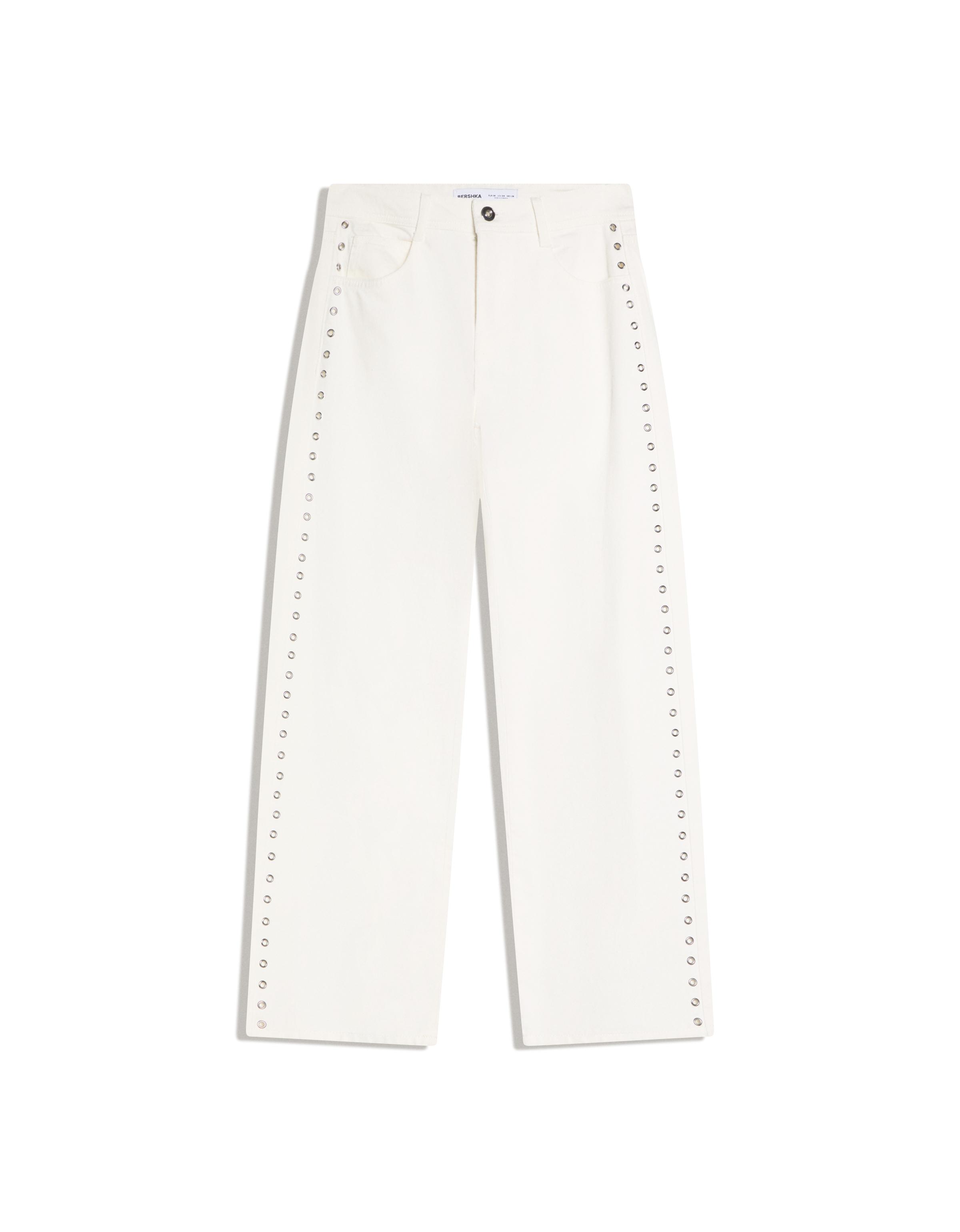 Low-rise baggy studded jeans