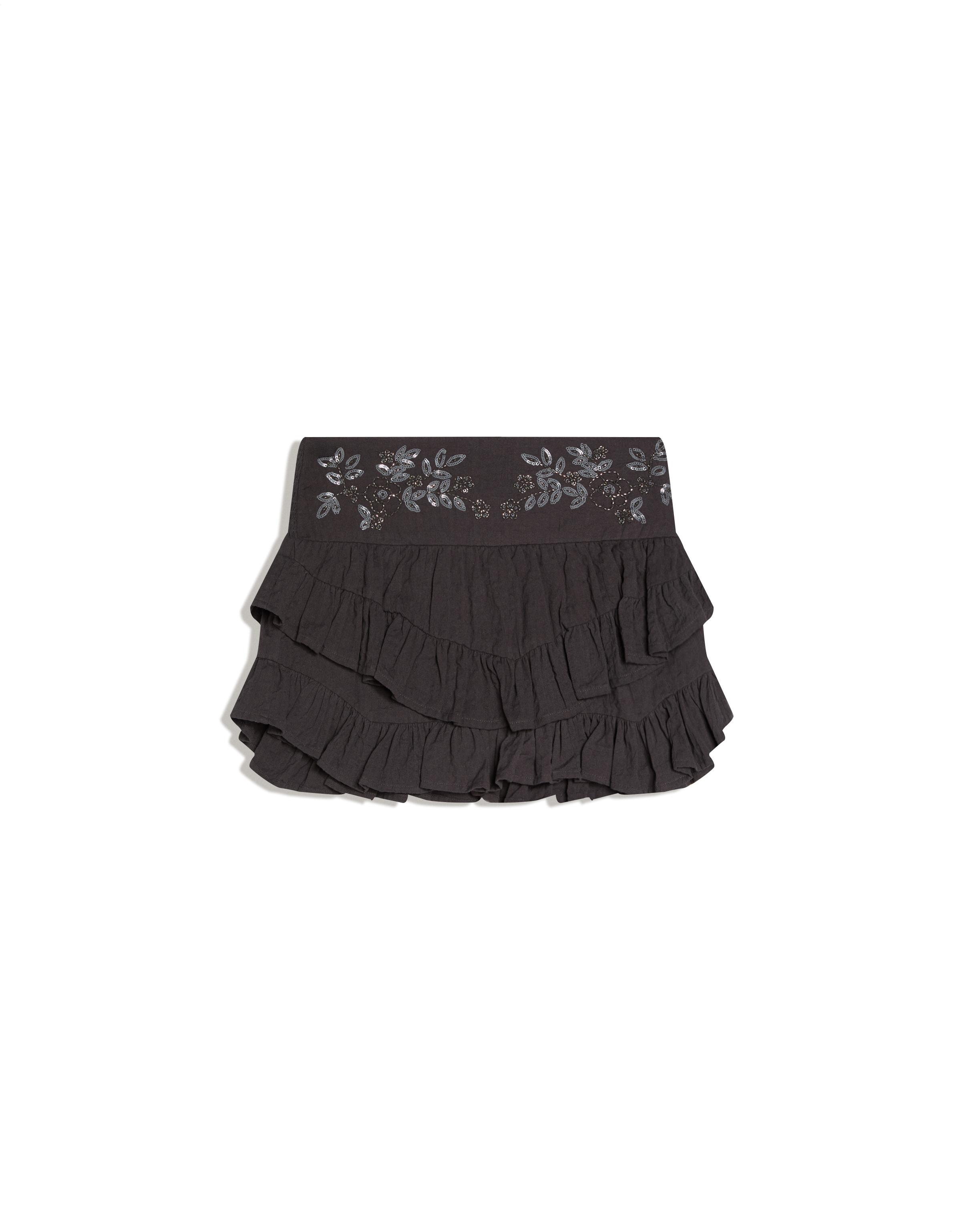Mini skirt with ruffles and shimmery waistband