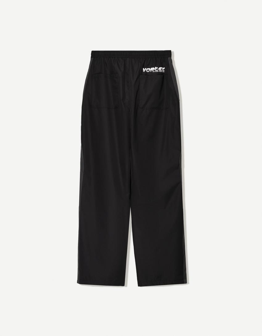 Technical trousers with sporty trim-Black-4