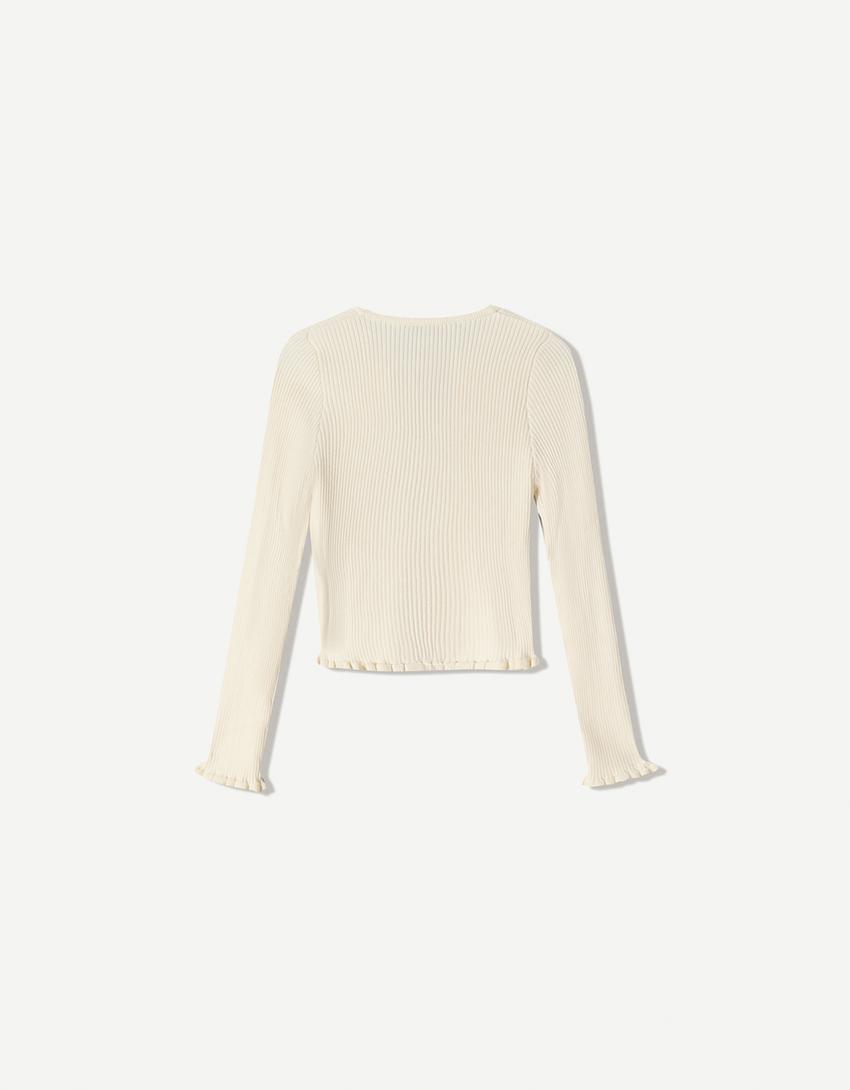Vest met volant en strik-Ecru