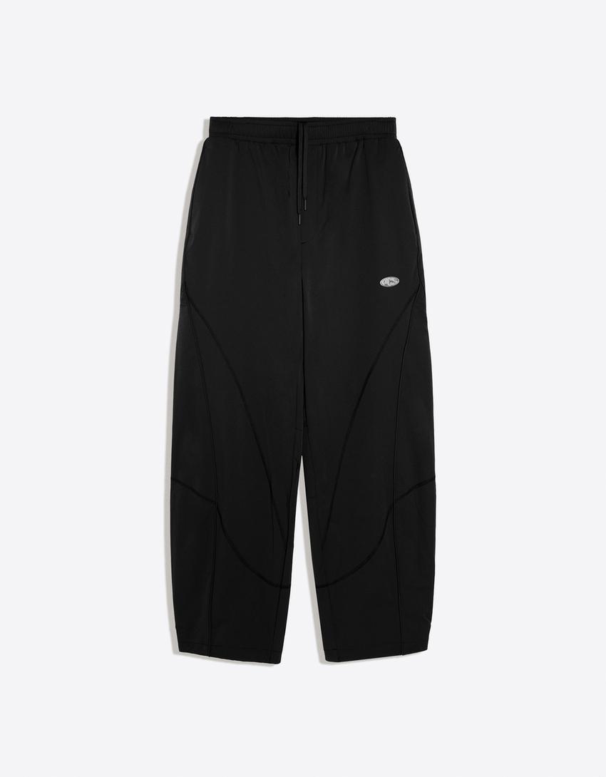Technical barrel trousers-Black