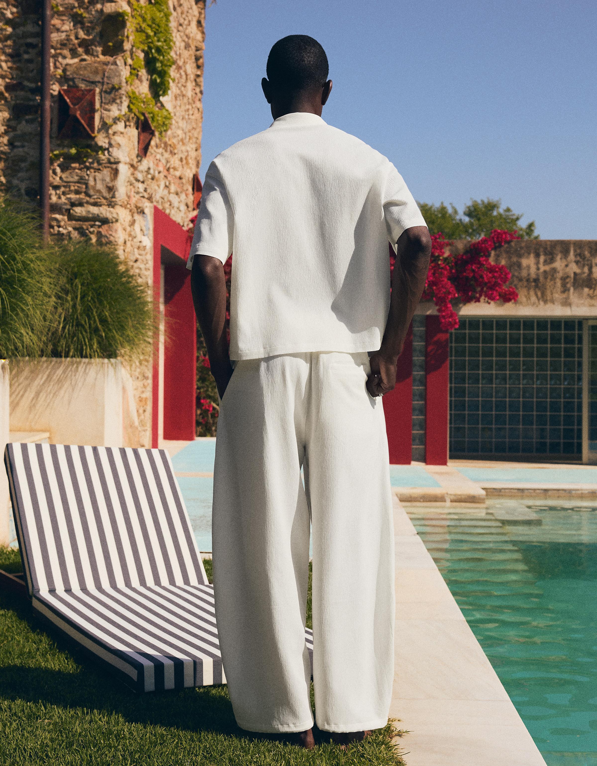 Pleated semi-jogger super baggy trousers — White