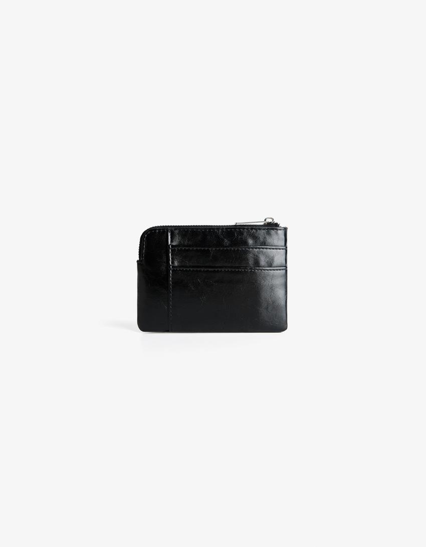 Porta-moedas efeito camurça tachas-Preto