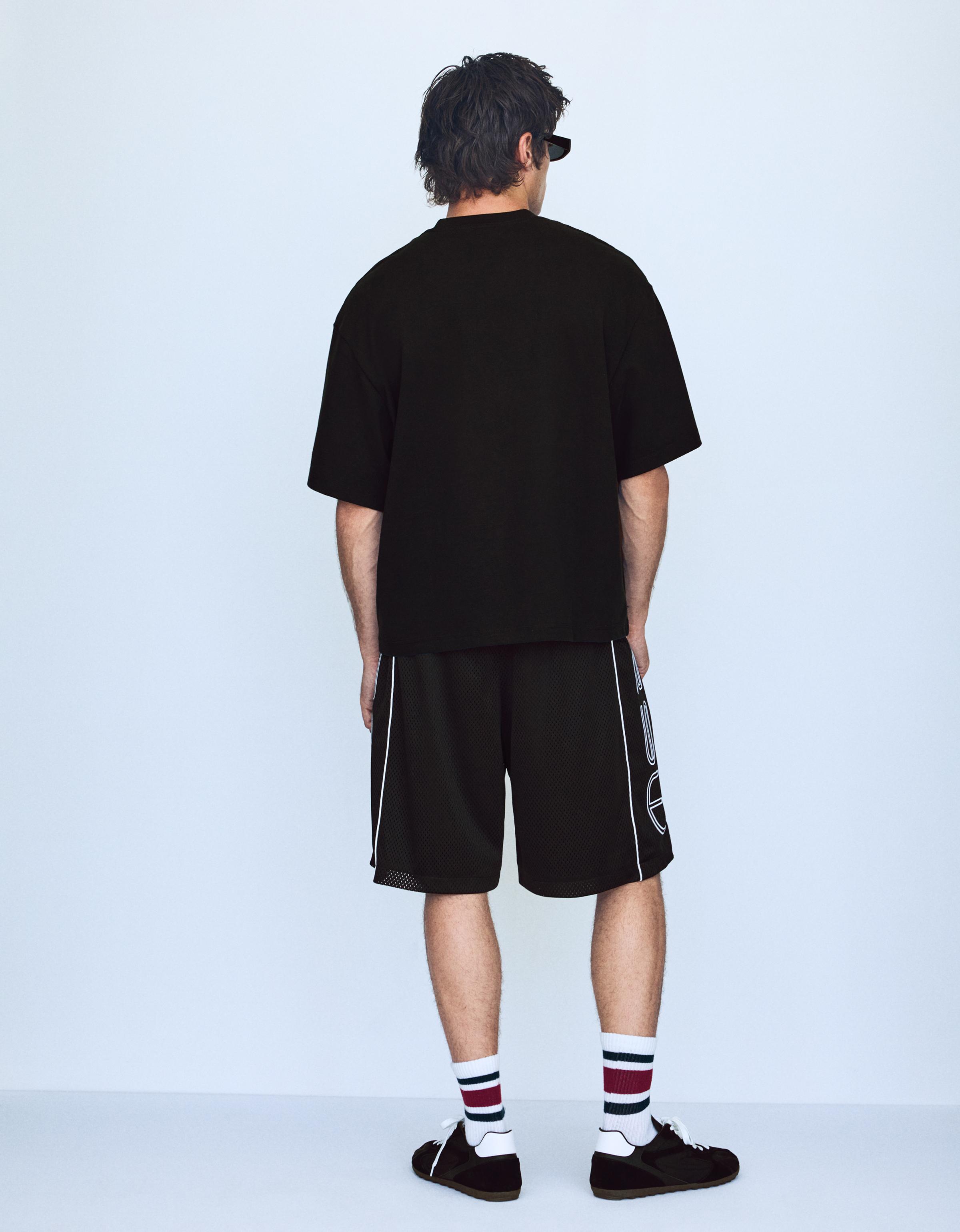 Contrast print mesh Bermuda shorts — Black
