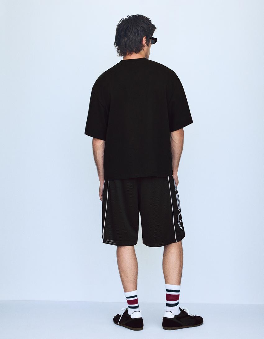 Bermuda mesh contraste print-Negro