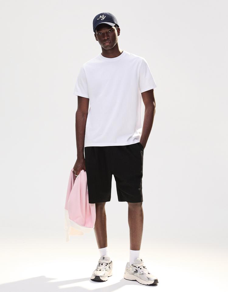 Textured plush Bermuda shorts — Black