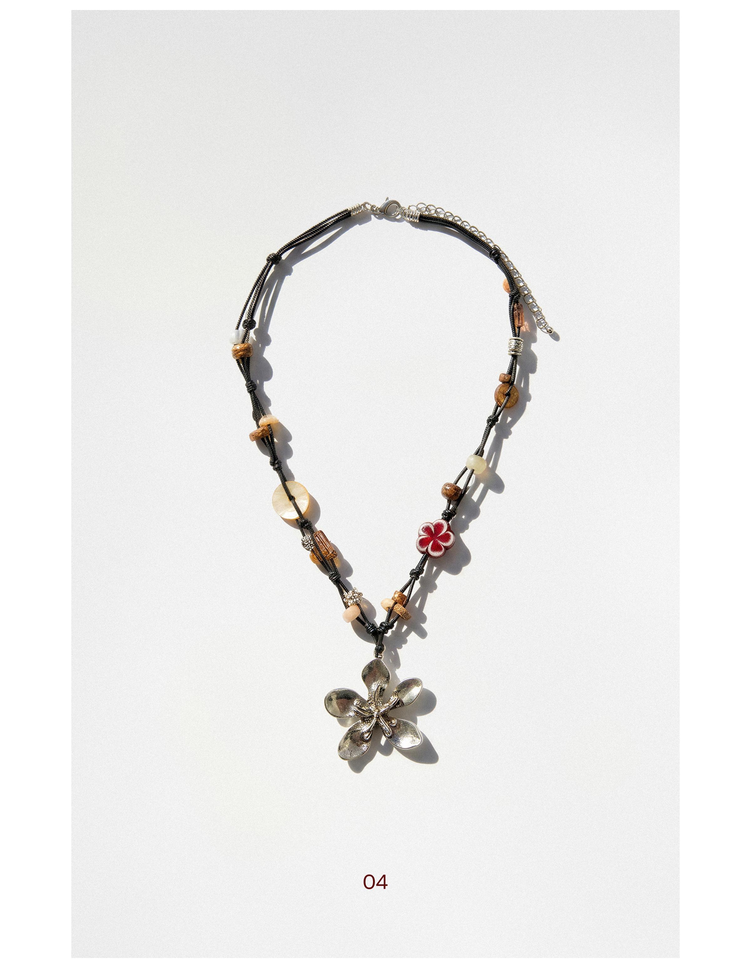 Floral cord and stone necklace — Brown