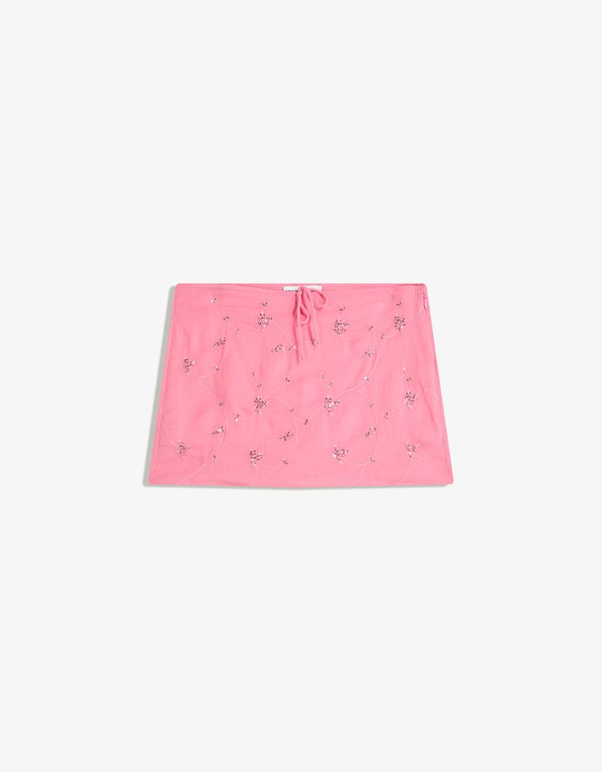 Minijupe brodée-Rose