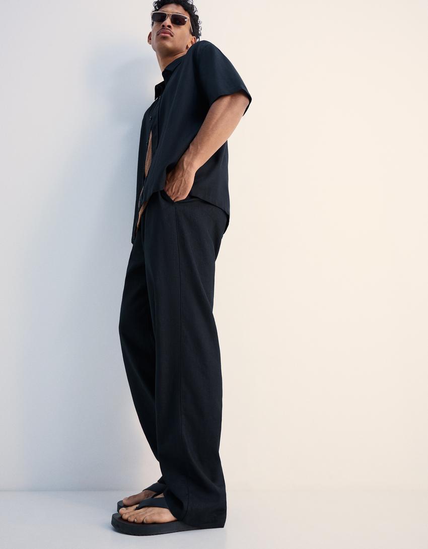 بنطلون رياضي بمزيج كتاني وساق عريضة-أسود