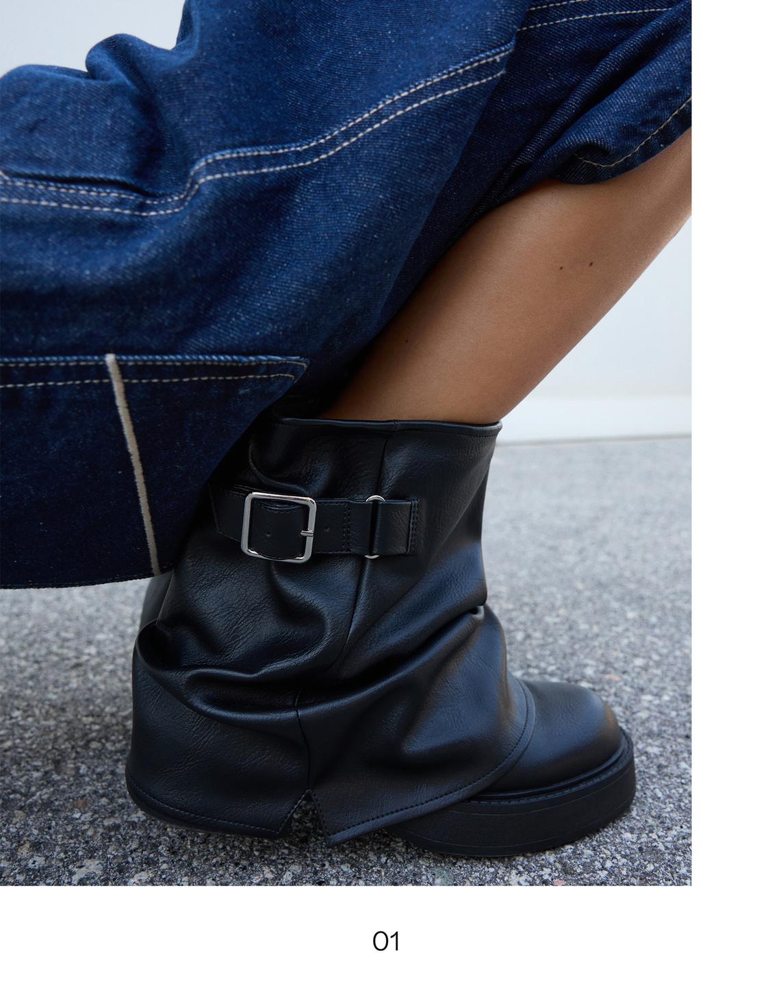 Flat ankle boots with buckle