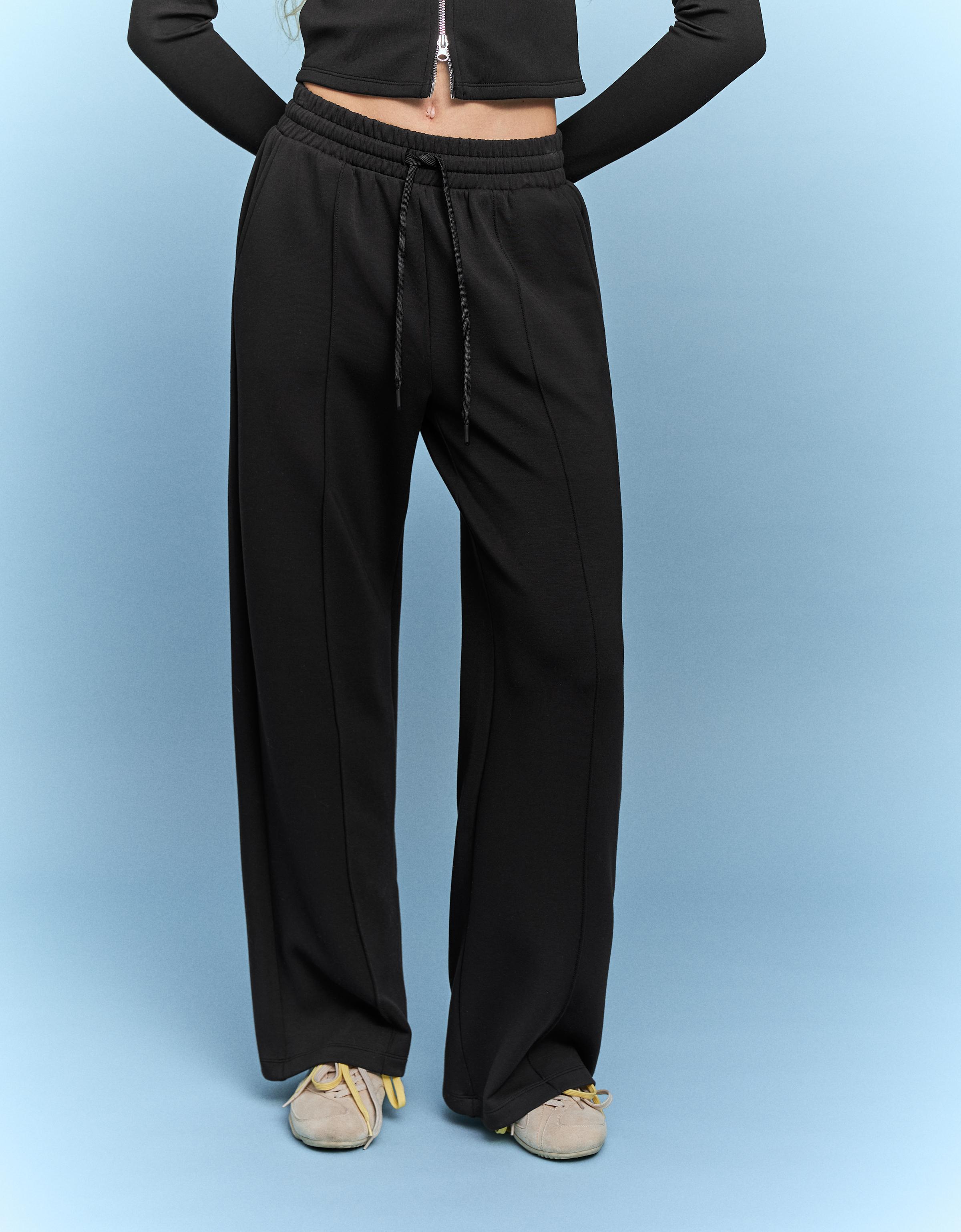 Yumuşak dokulu geniş paça pantolon - Görsel 29