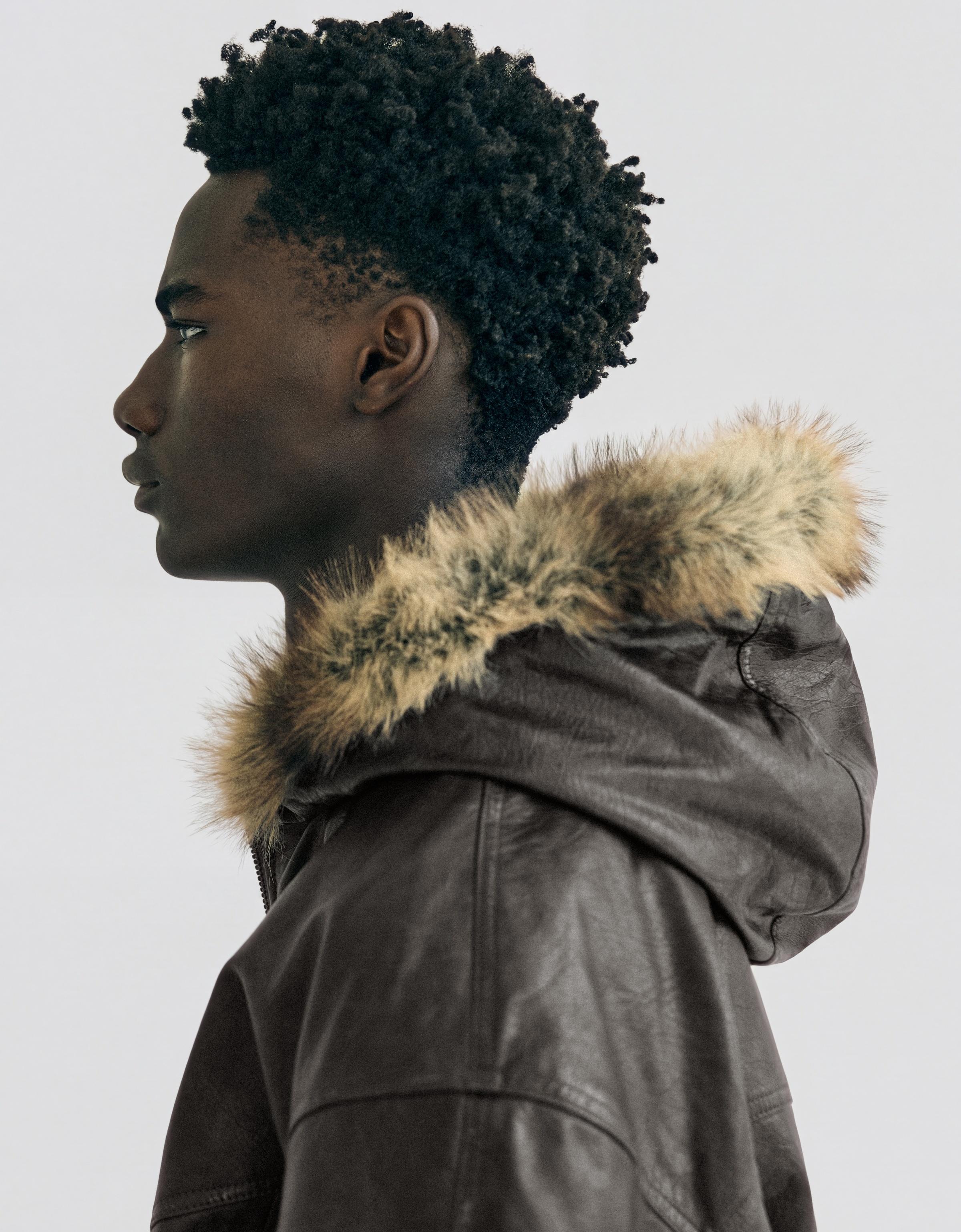Leather effect jacket with faux fur hood — Brown
