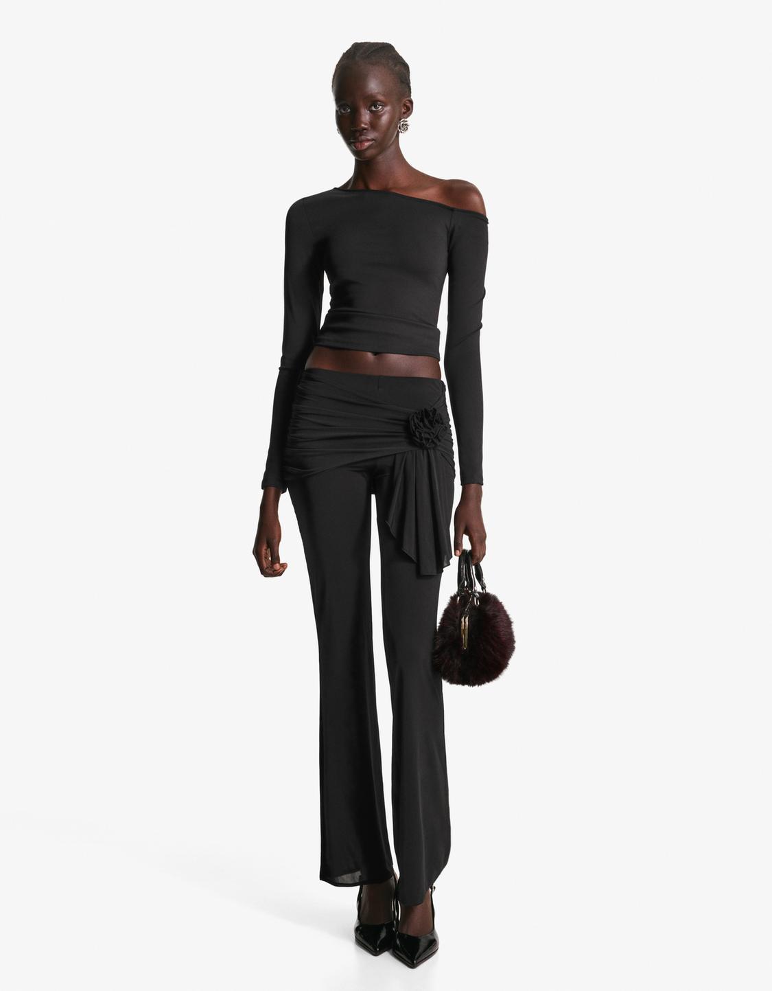 Floral draped bell bottom trousers