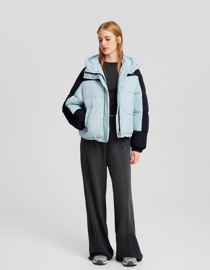 Caçadora caputxa bloc de color amb niló-Blau cel-3