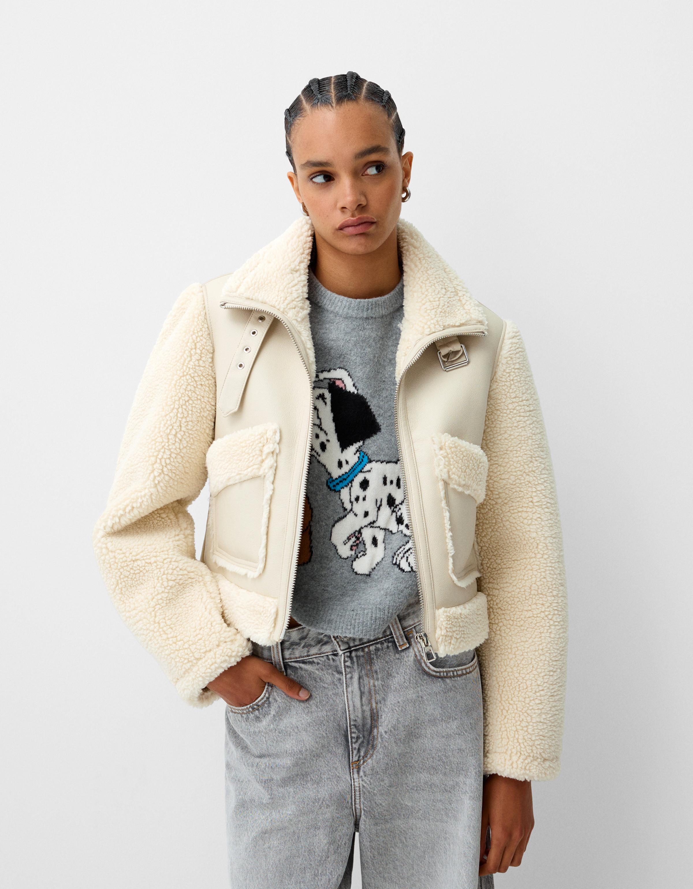 Double faced jacket with faux shearling sleeves