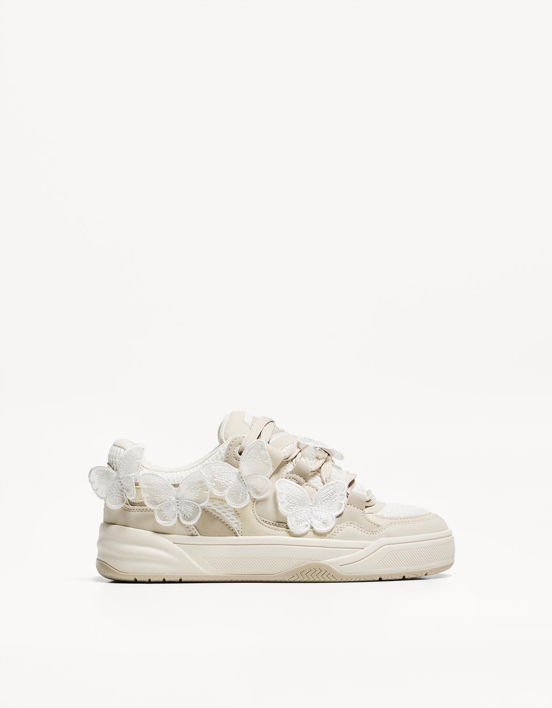 Skater trainers with butterfly details