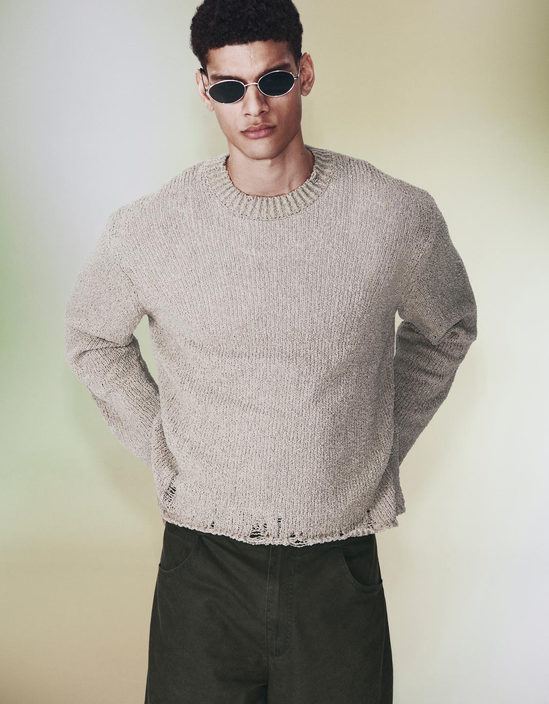 Ripped rustic boxy fit sweater