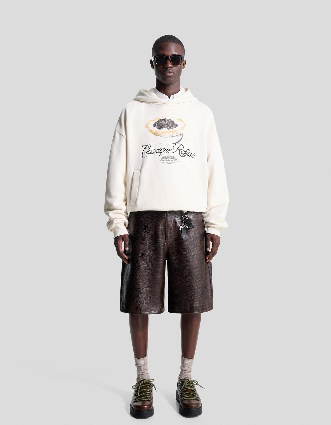 Hoodie with embroidered print